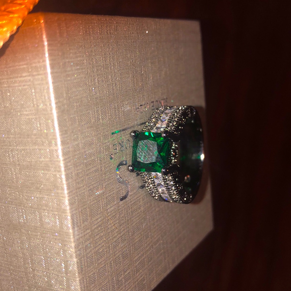 Emerald Colored Ring.